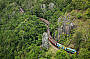 Kuranda Scenic Railway winding past Robbs Monument